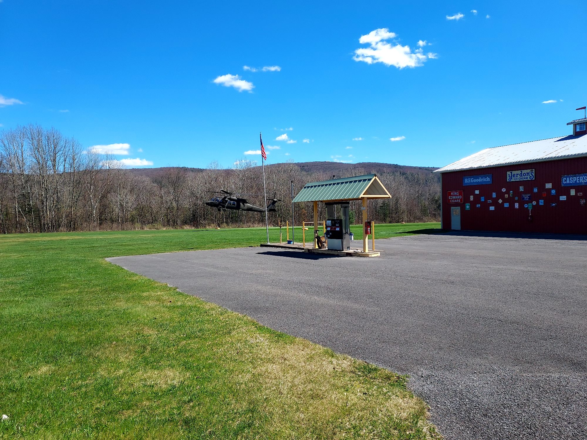 Blackhawk helicopter visit with red hangar and vintage signs
