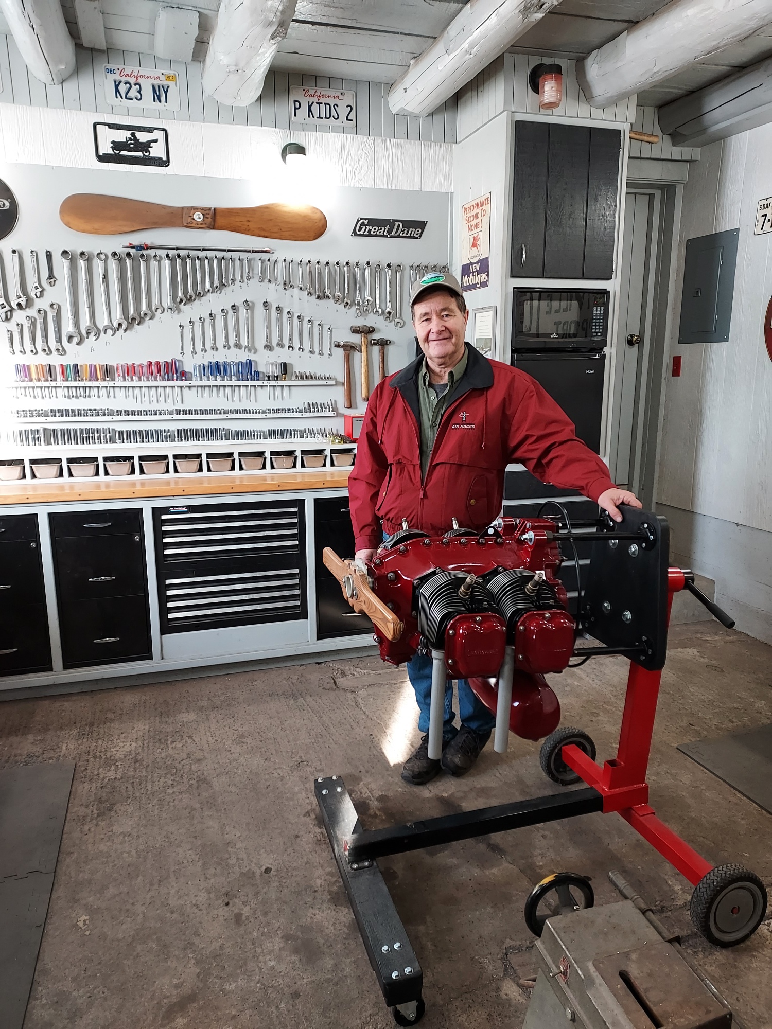 Airport manager with rebuilt engine in the shop